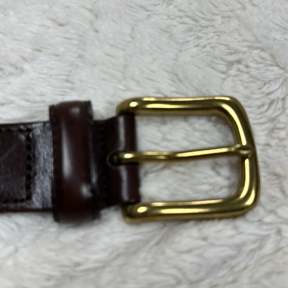 Beautiful dark brown woven belt, leather  tabs made in Argentina,  size 32